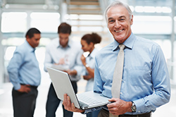 man-holding-laptop.jpg